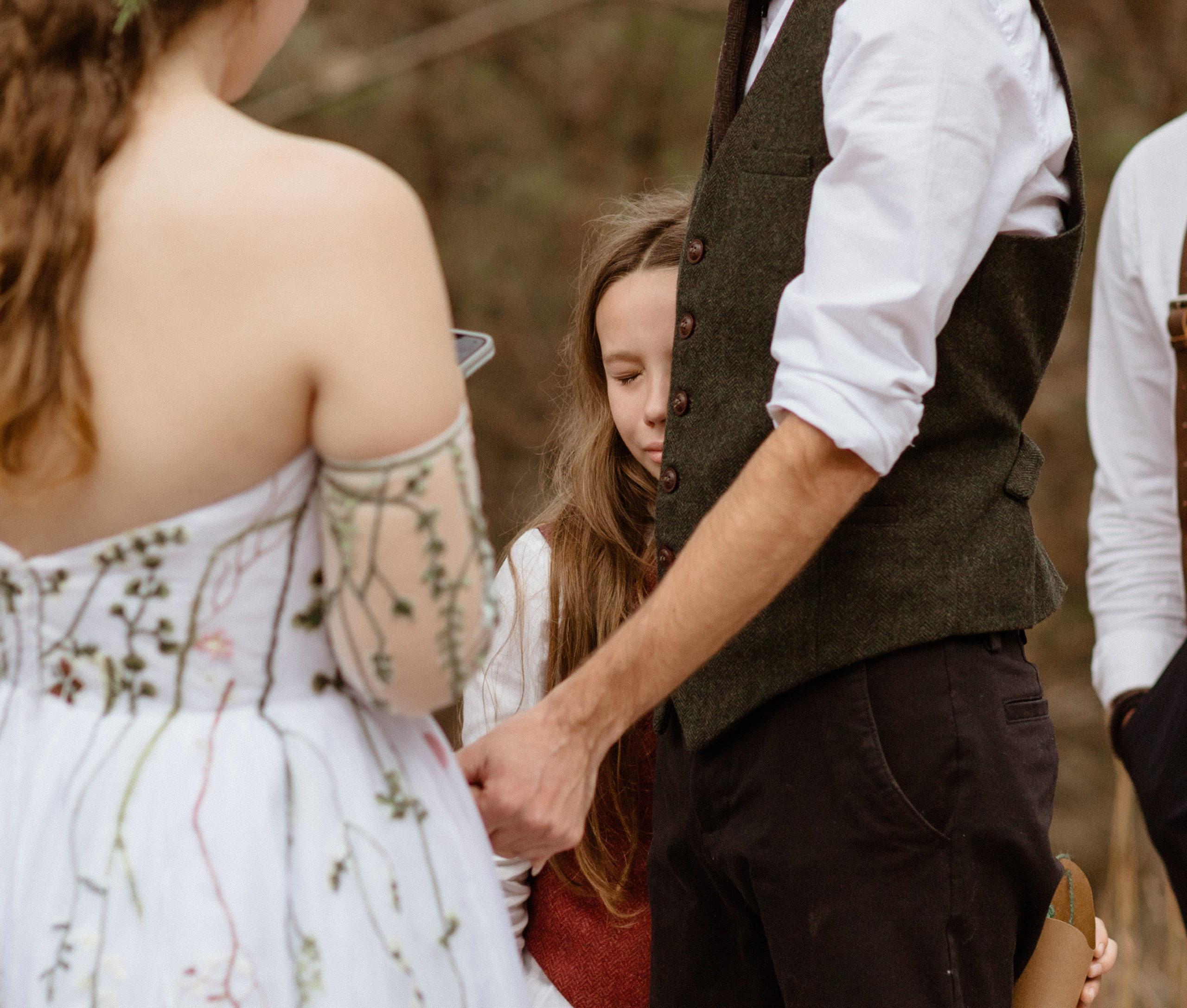 The bride's son gets emotional during their ceremony in the blue ridge mountains of north carolina