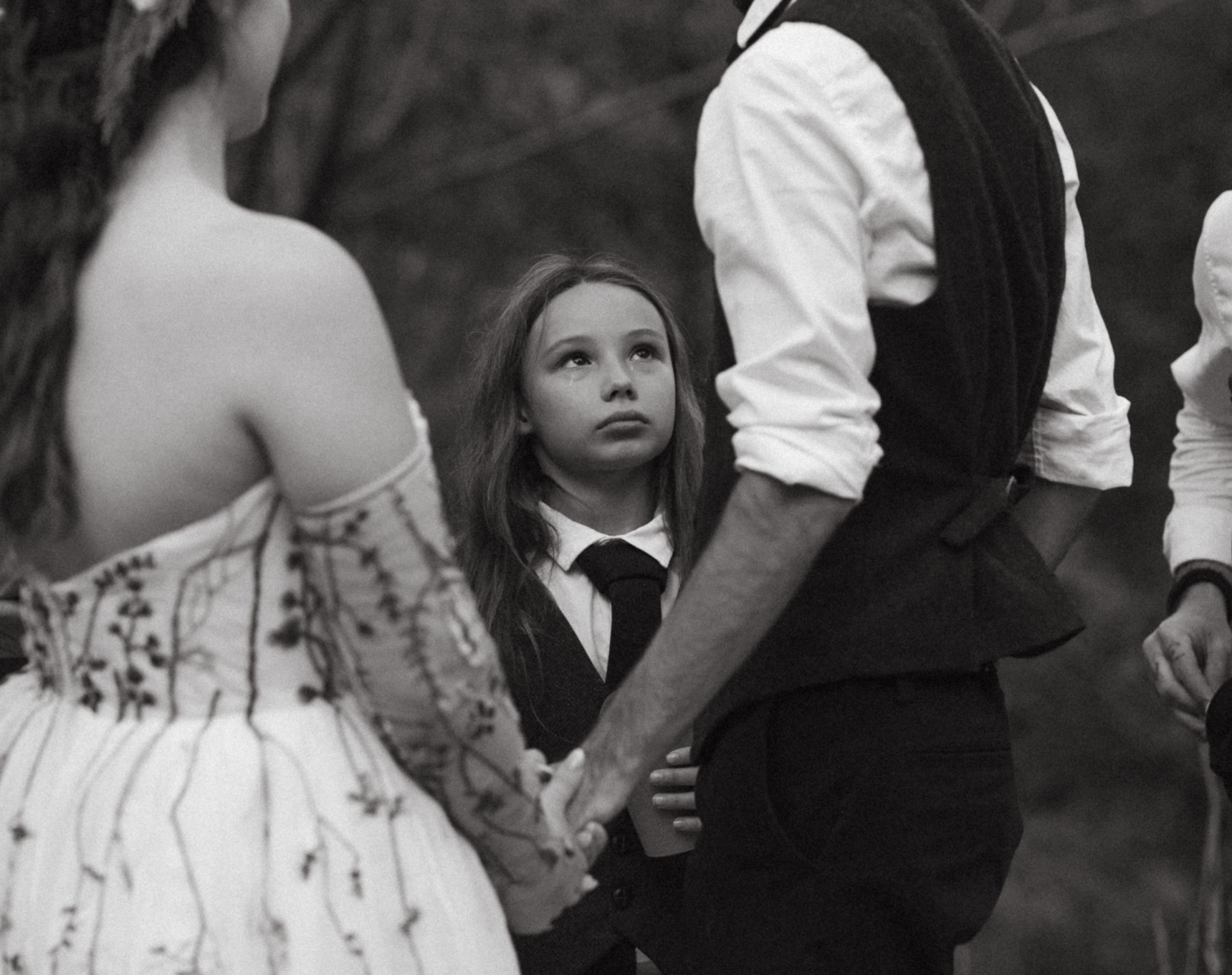 The bride's son becomes emotional at their wedding ceremony in the blue ridge mountains of North Carolina