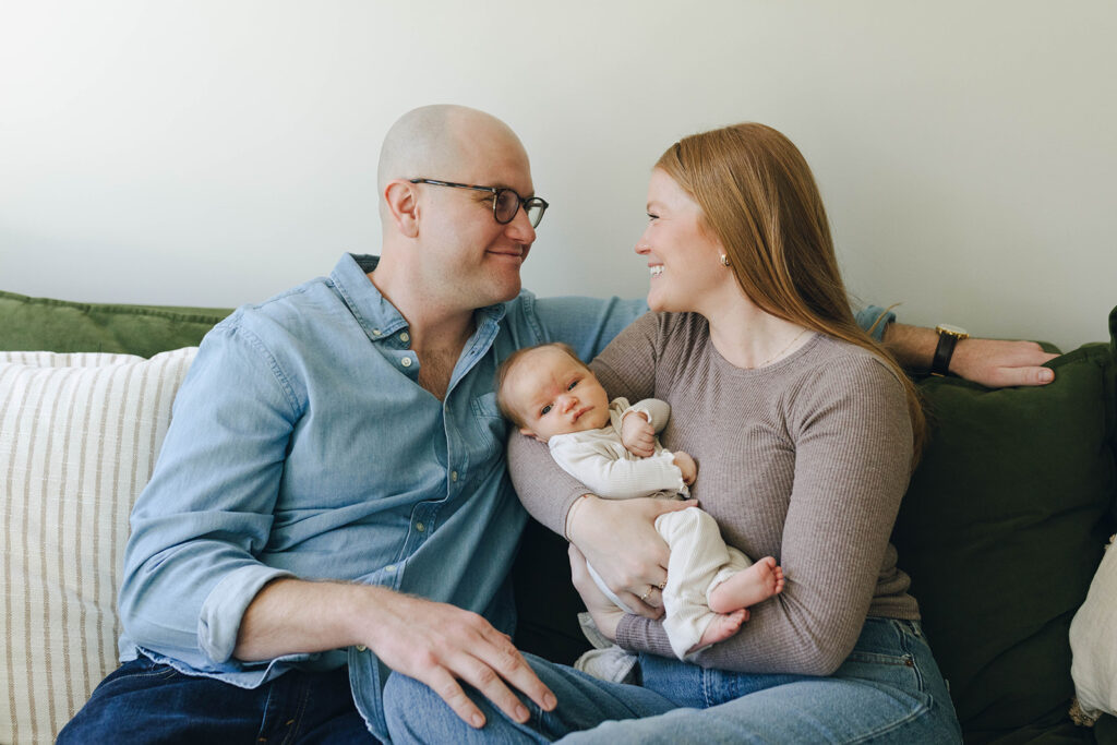 Candid newborn family photos in wilmington north carolina