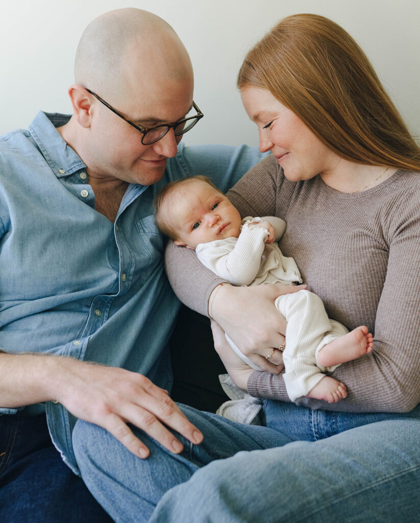 Candid newborn family photos in wilmington north carolina