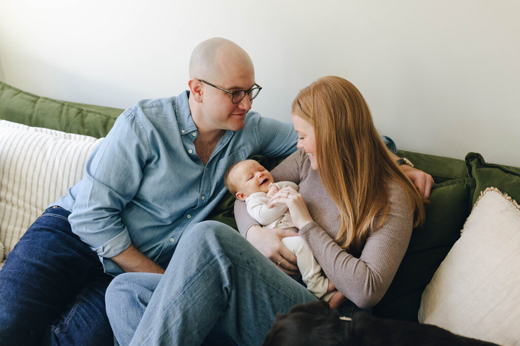 Candid newborn family photos in wilmington north carolina