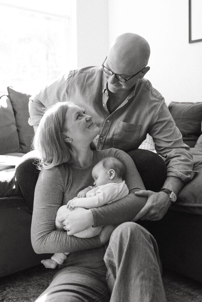 Candid newborn family photos in wilmington north carolina